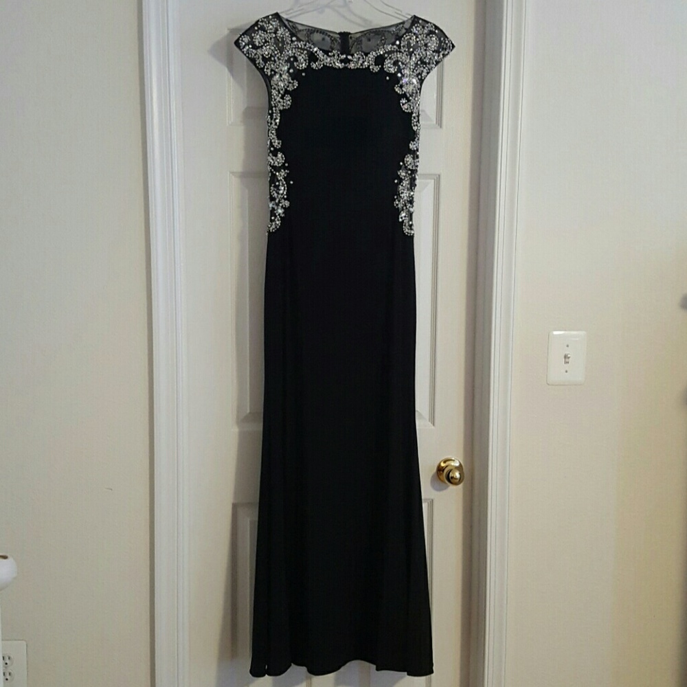 Elegant Black gown with jewels.