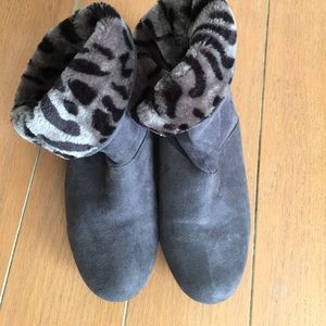 Gray slouch boots with animal print inside