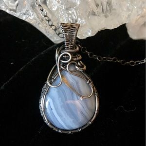 Handmade fine silver wrapped pendant