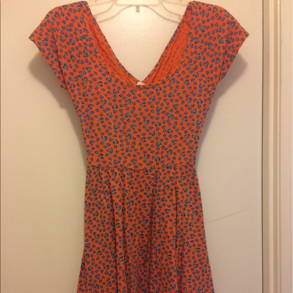 Orange skater dress with cut out on back