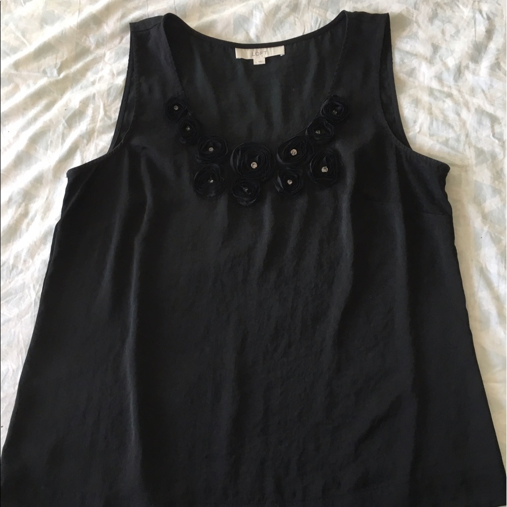 Black tank top with floral detail