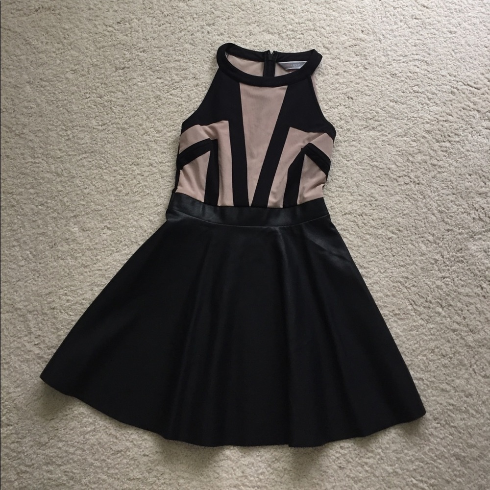 Stylish tan and black dress