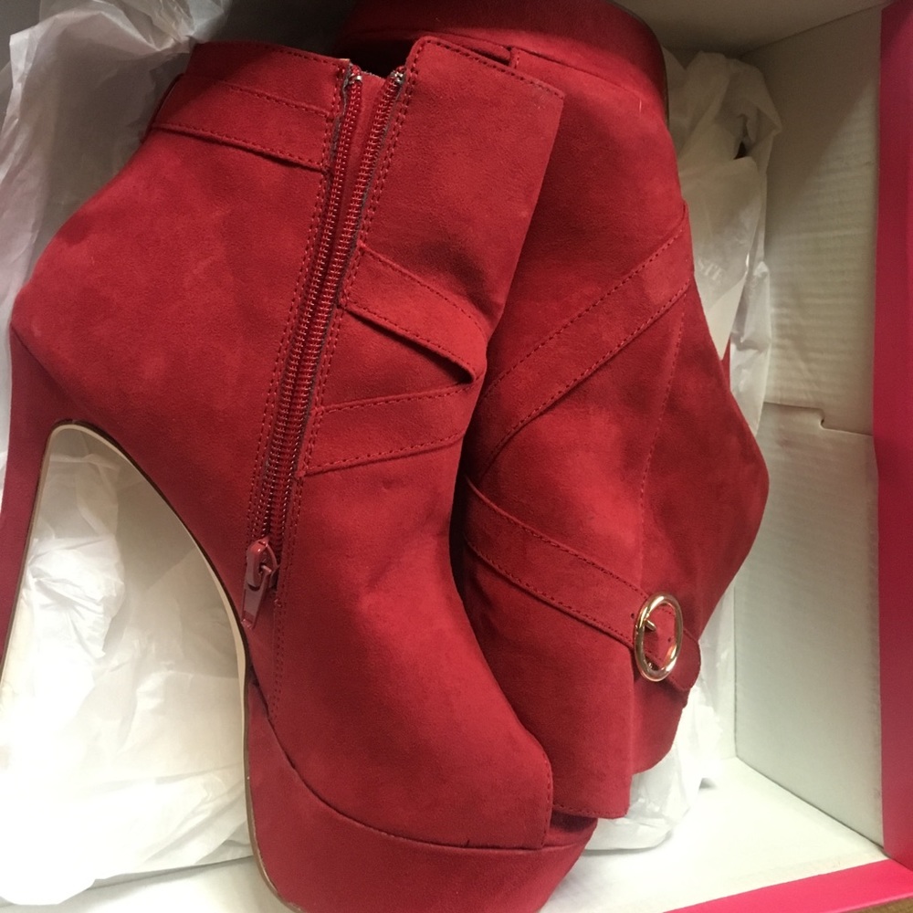 Red heels. Never worn