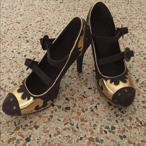 Brown and gold heels