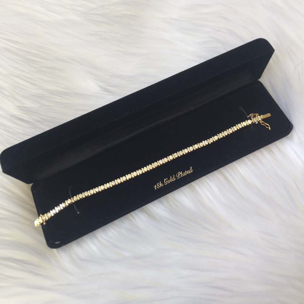 CZ 18k Diamond Tennis bracelet.