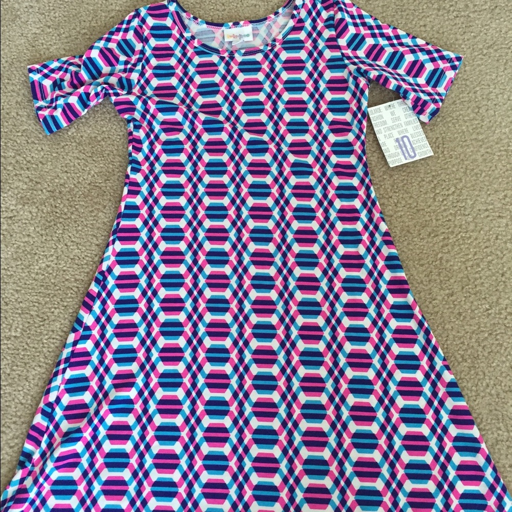 Adorable little girl's Lularoe Adeline dress