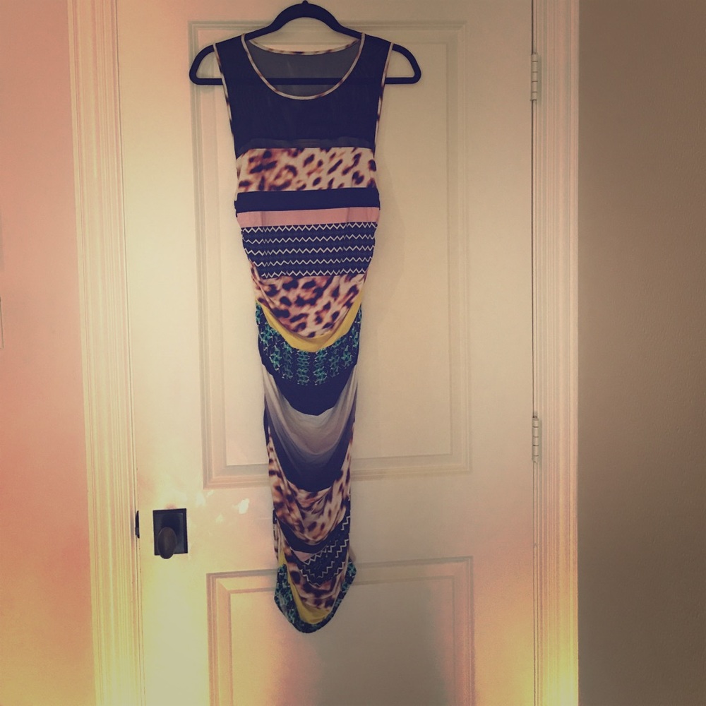 Beautiful and super flattering dress.