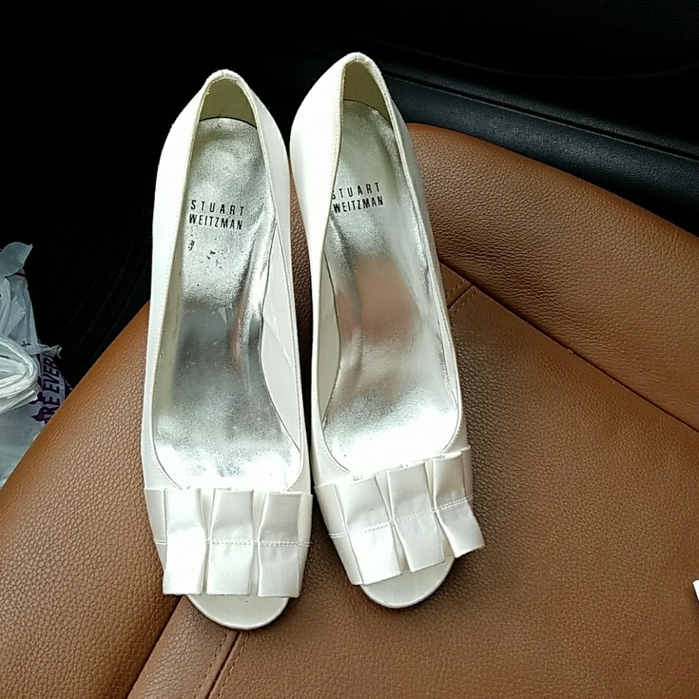 Stuart Weitzman white pumps