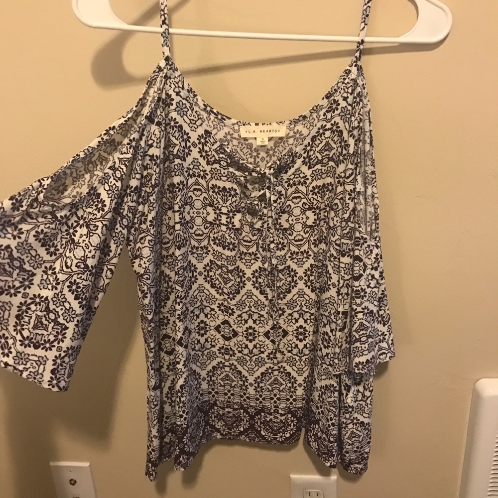 Cold shoulder floral lace up top