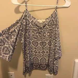 Cold shoulder floral lace up top