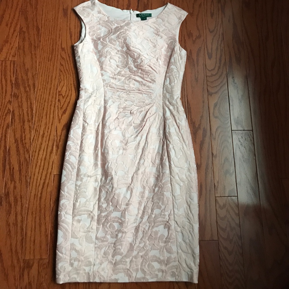 Knee length dress with rouching on left side.