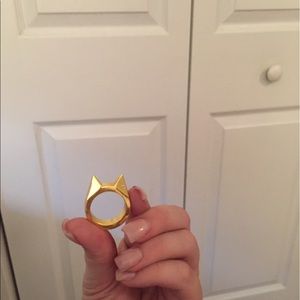 Gold "cat" self defense ring