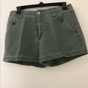 Dirty green denim shorts