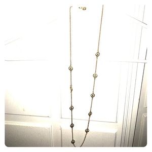 Gold peace sign necklace