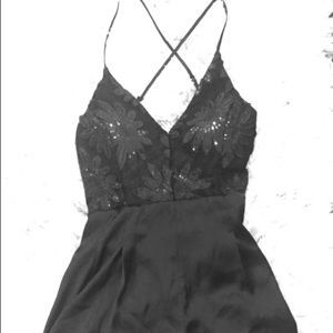 Black Romper (large, never worn)