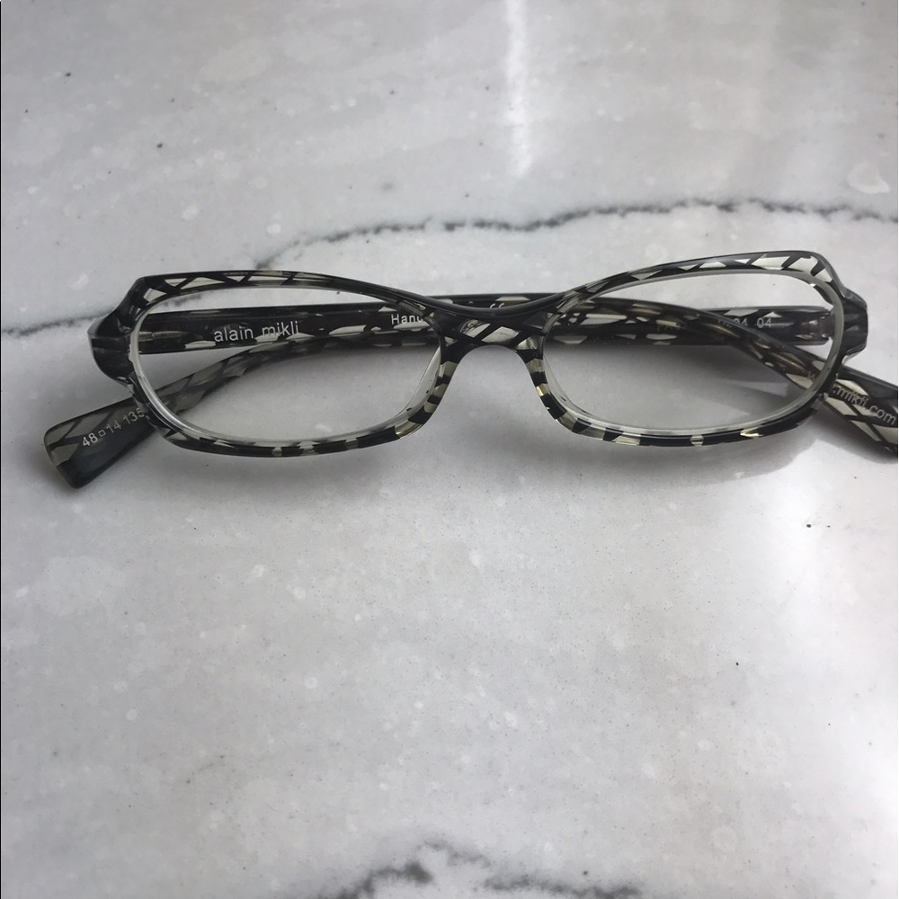 Alain Milki glasses in excellent condition.