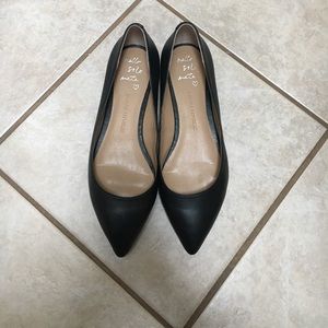 Black pointed toe flats