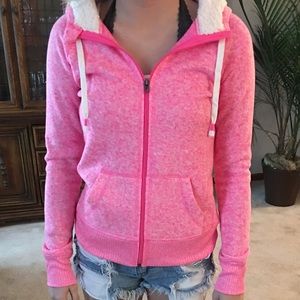 Pink zip up jacket, fluffy hood