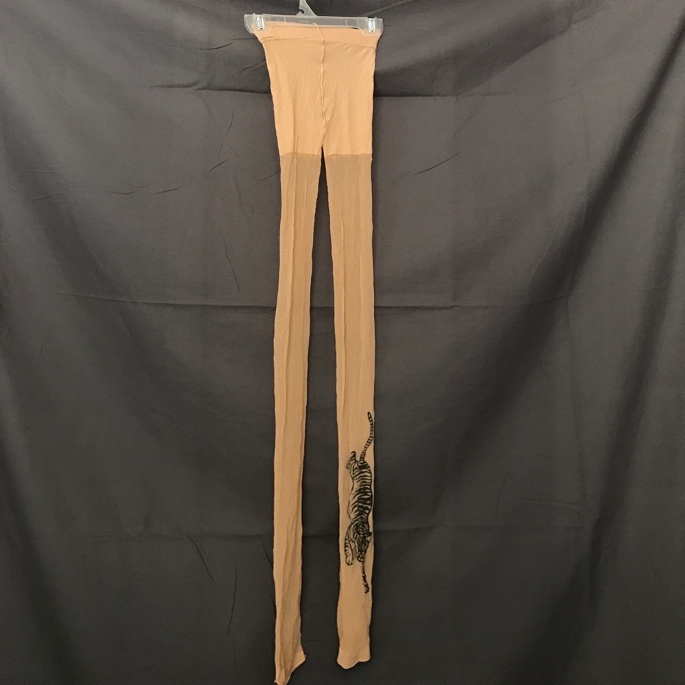 Tights with a tiger. Tattoo tights