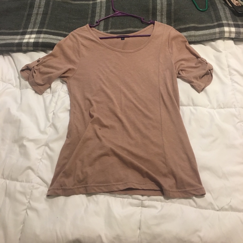 Cute top with buttons on the sleeve.