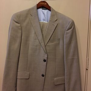 Tommy Hilfiger shark skin suit.