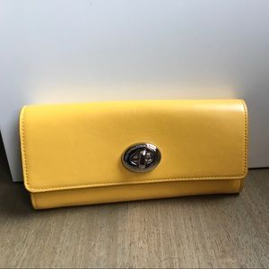 Brand new yellow Coach wallet