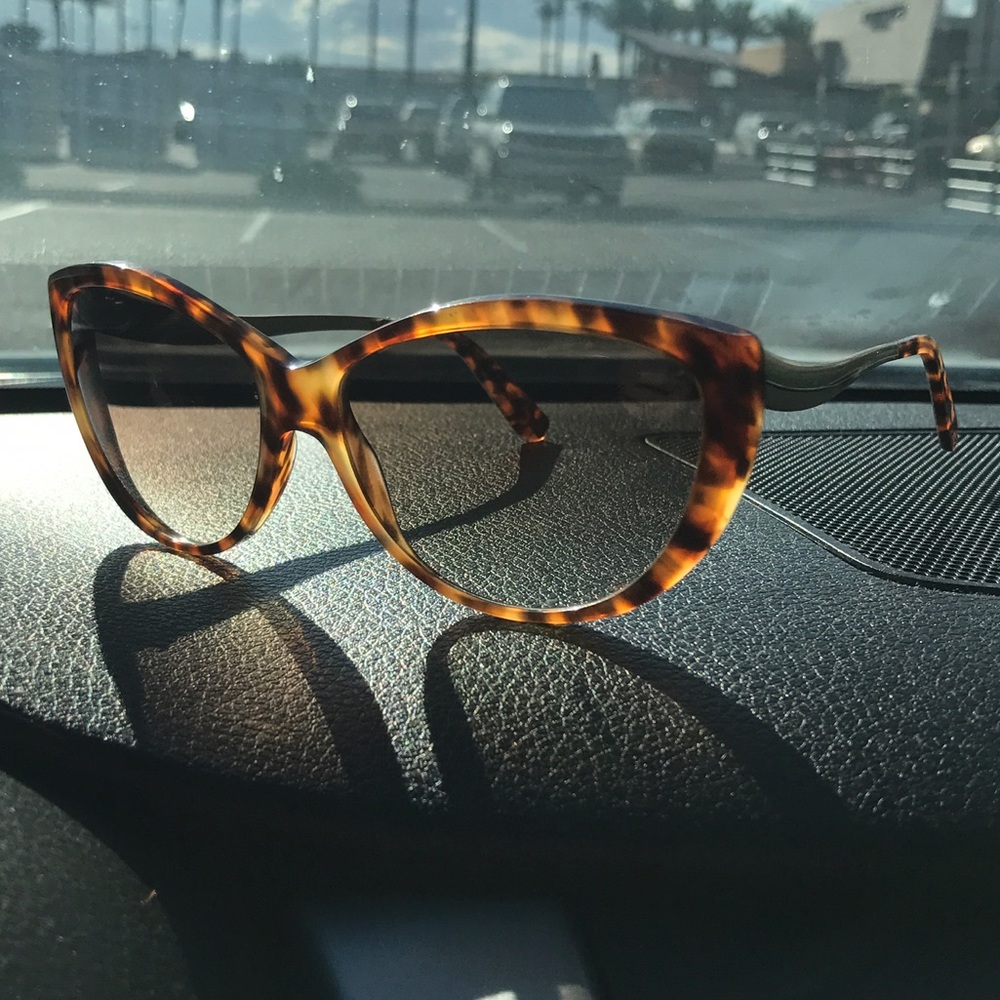 Alexander McQueen sunglasses.