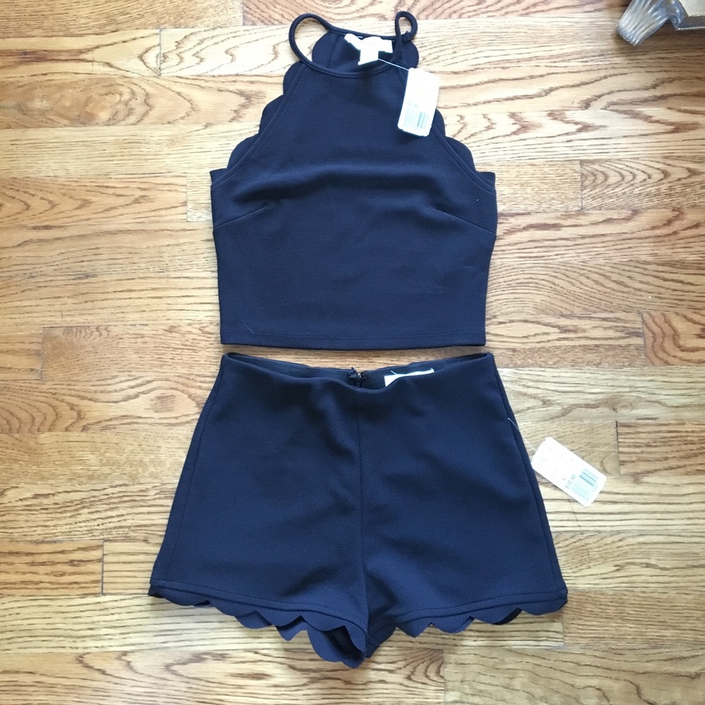Black two piece scalloped outfit size small