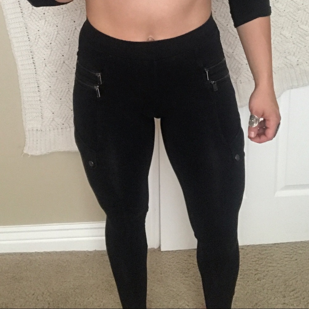Express black leggings with zippers and pockets
