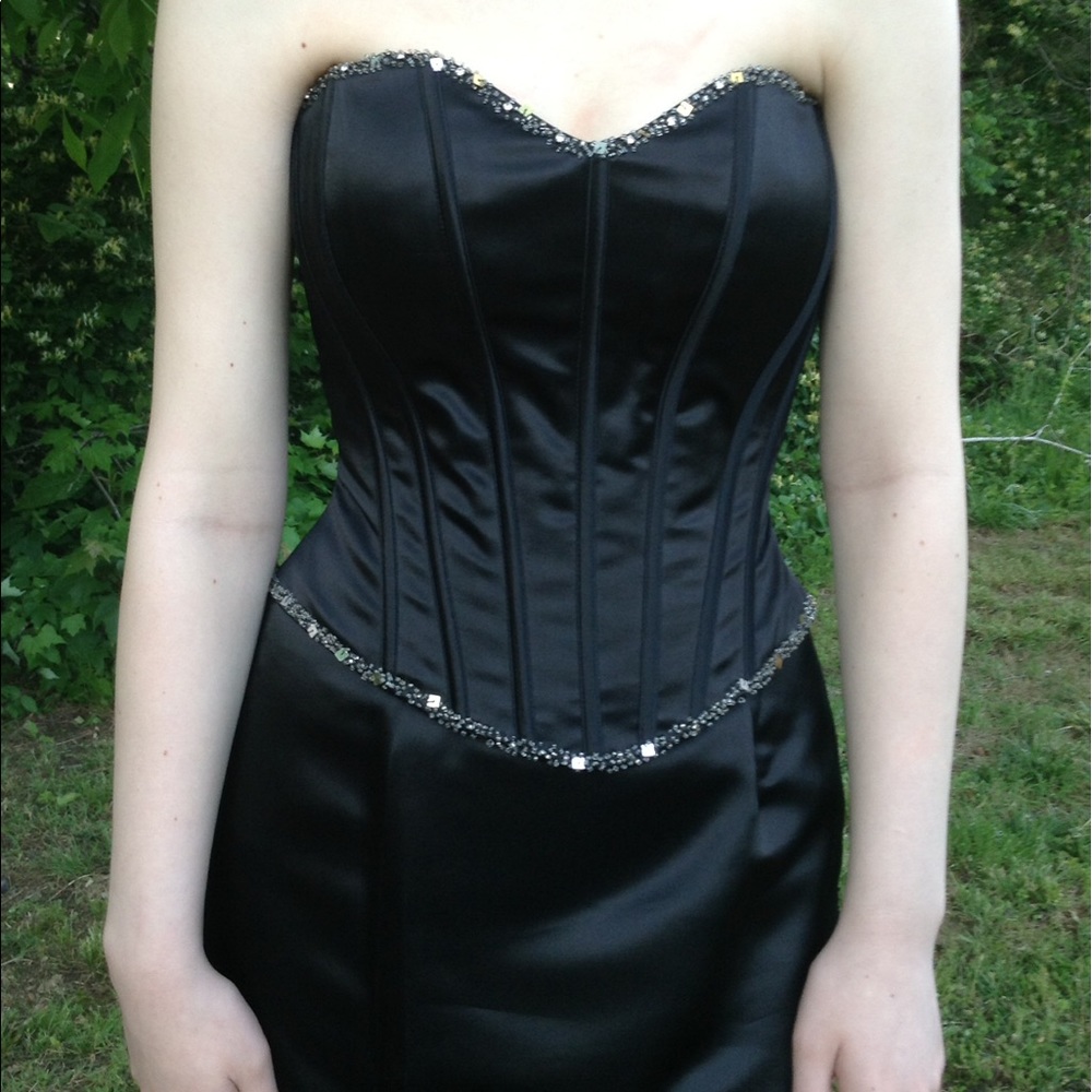 Black prom dress with silver embellishments.