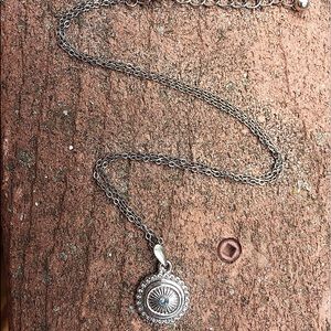 Silver Medallion necklace with blue center stone