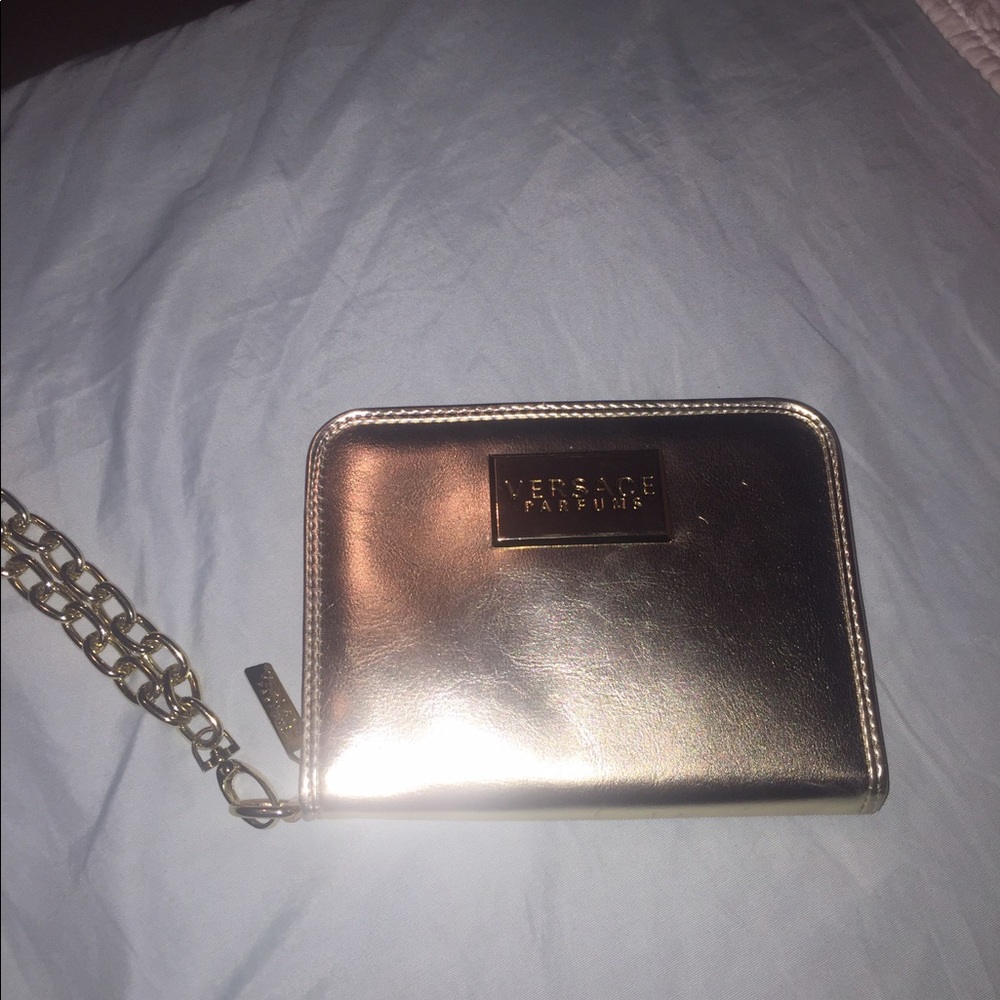 Barely used Versace Wristlet.