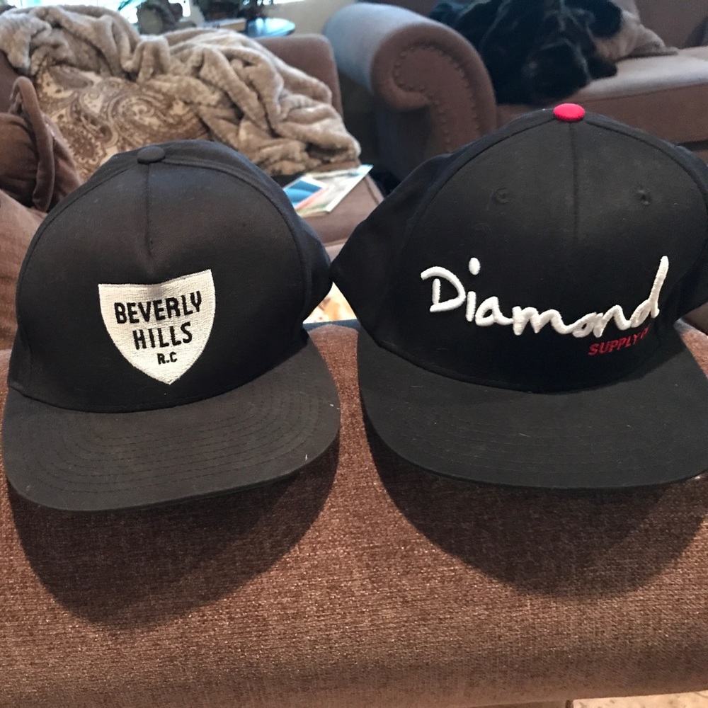 2 black SnapBacks