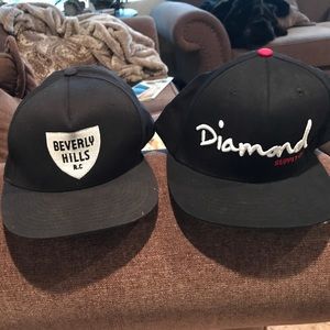 2 black SnapBacks