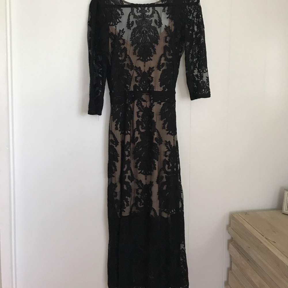Black lace dress, low cut back