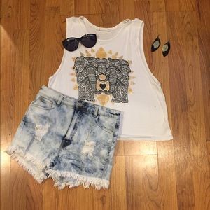 White cropped elephant design tank top.