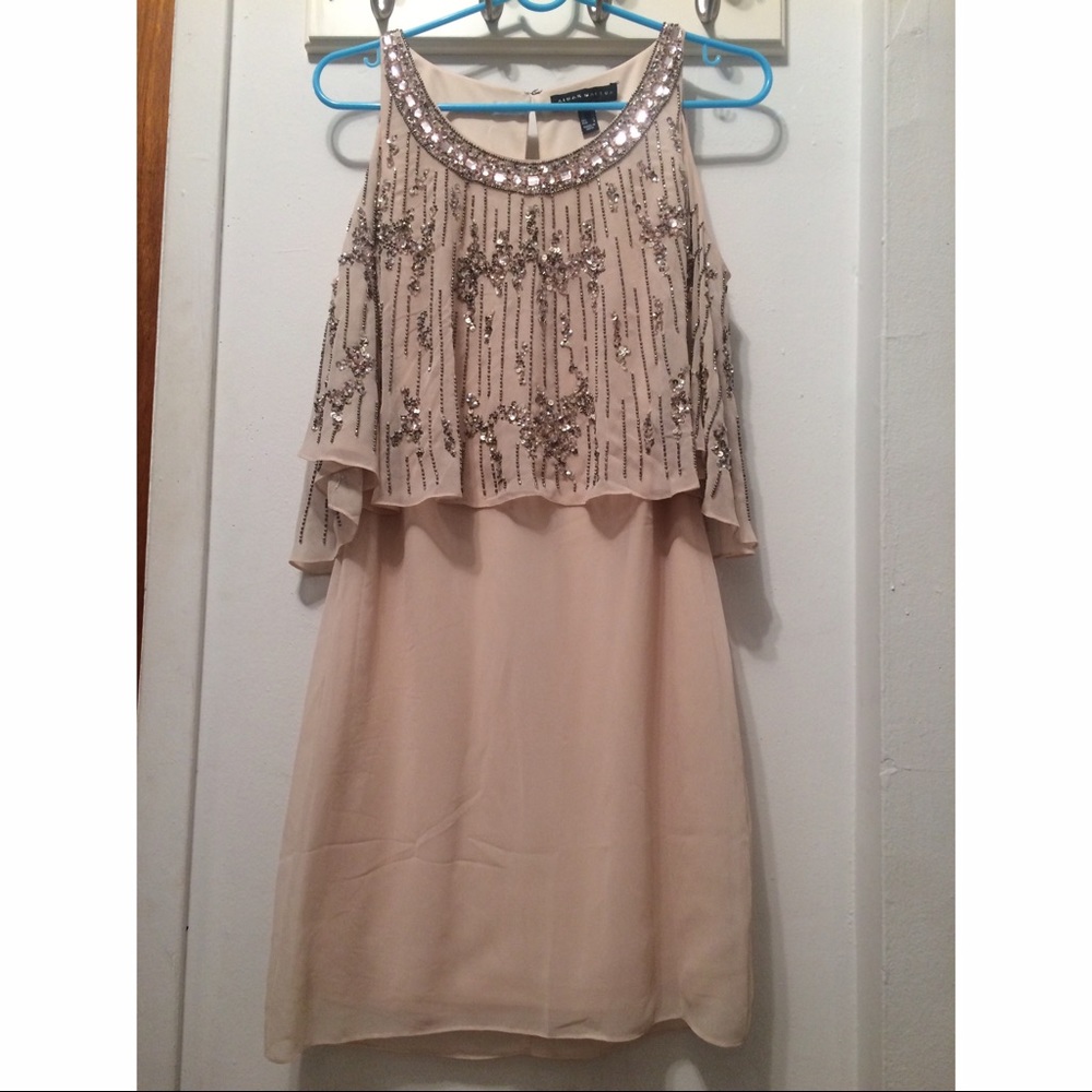 Knee-length embellished cocktail dress