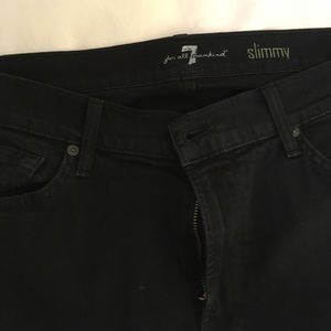 Men's black seven jeans.