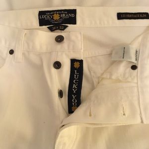 White Lucky Brand men's jeans.