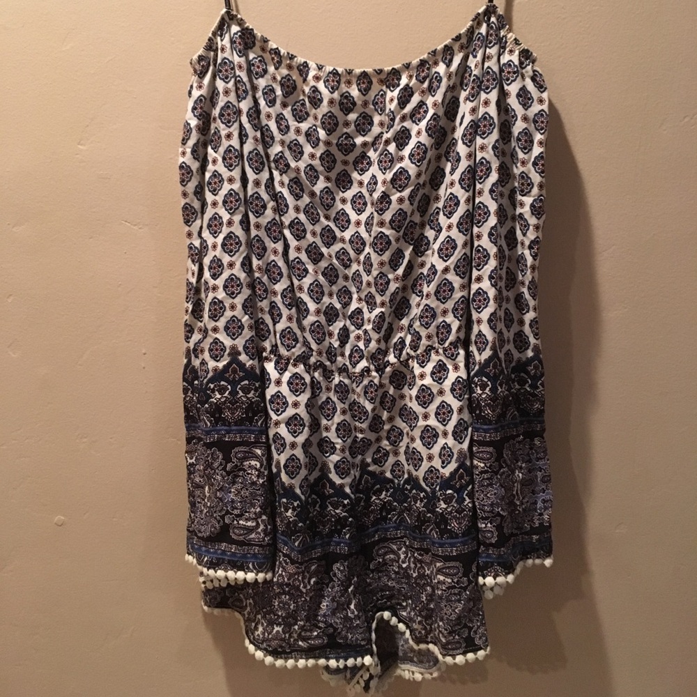 Boho print long sleeve romper with Pom Pom hem