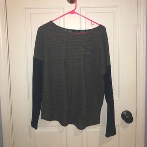 Green and black knit sweater