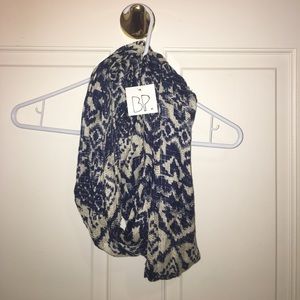 Navy blue and white patterned scarf