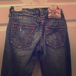 True religion stitched jeans with slight rips