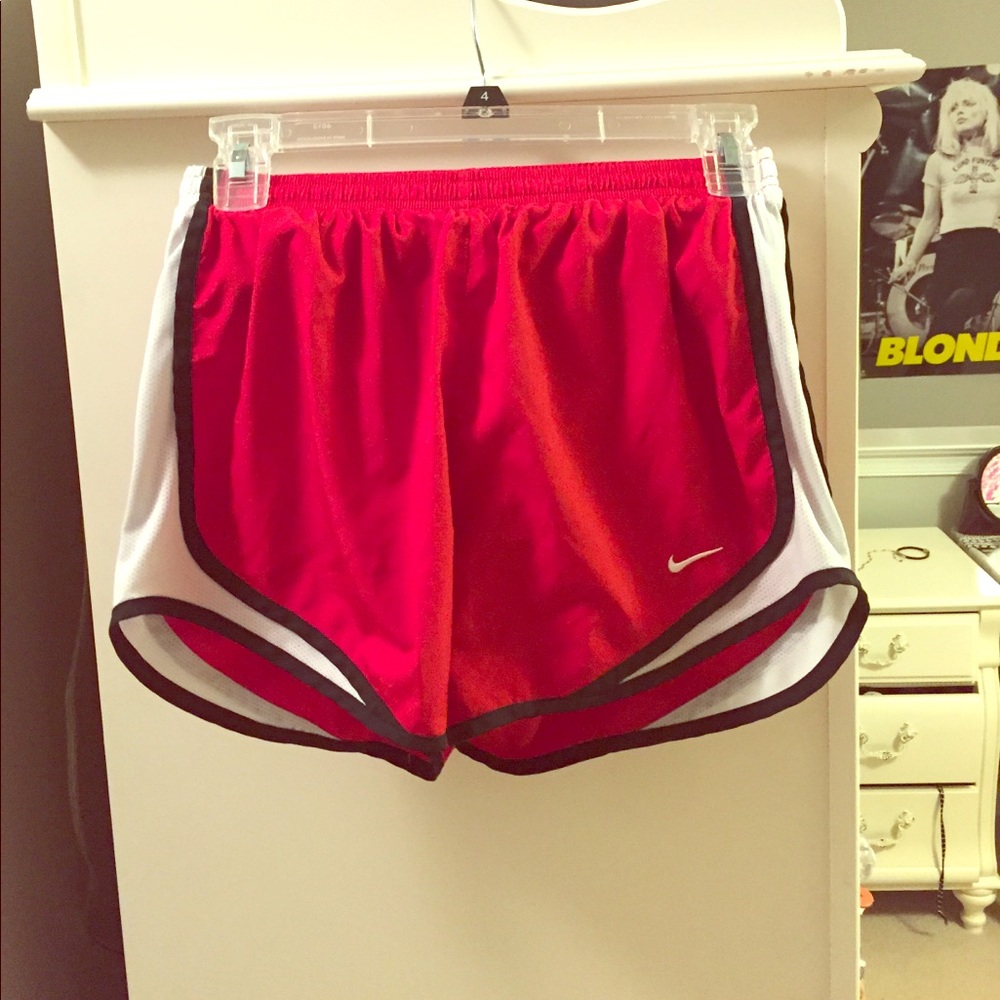 Red Nike running shorts