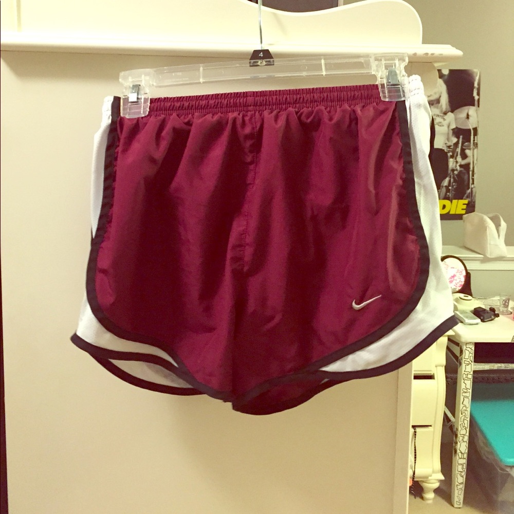 Maroon Nike running shorts
