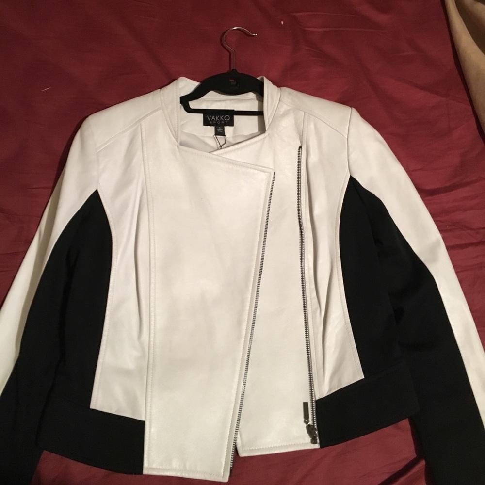 White and black womens leather jacket.