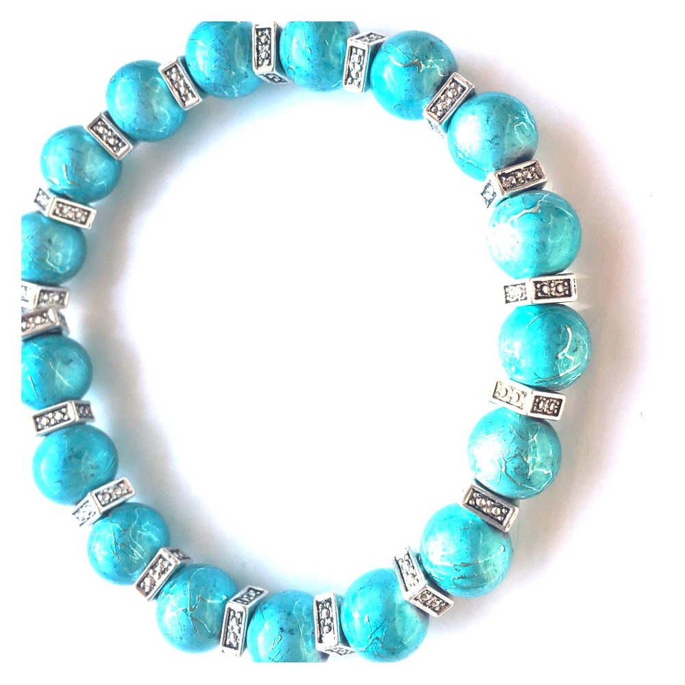 Turquoise glass beads with silver spacers