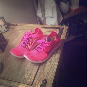 Pink Nike Free RN Flyknits