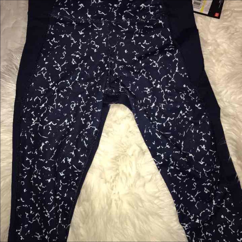 Under armour leggings w/ mesh by the ankle.