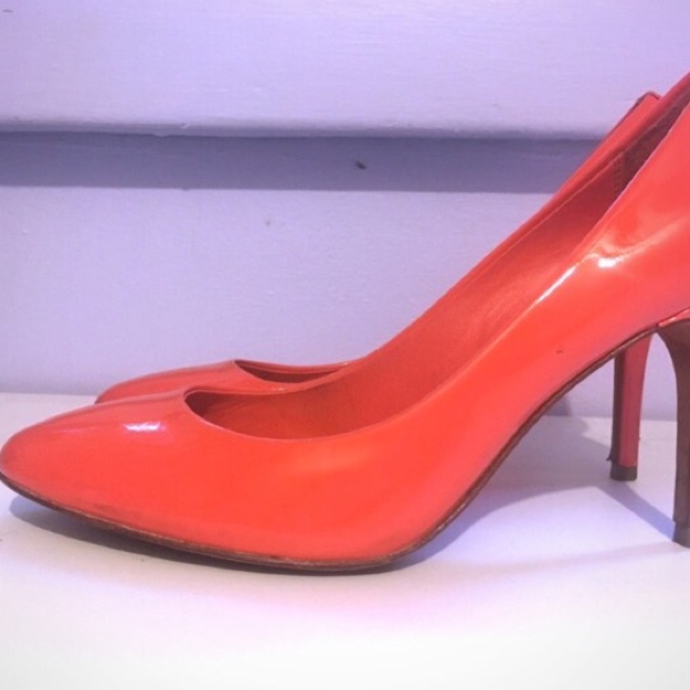 coral coach pumps